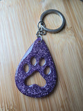 Porte clés en patte de chien  -couleur violet - la fabrique à pampille