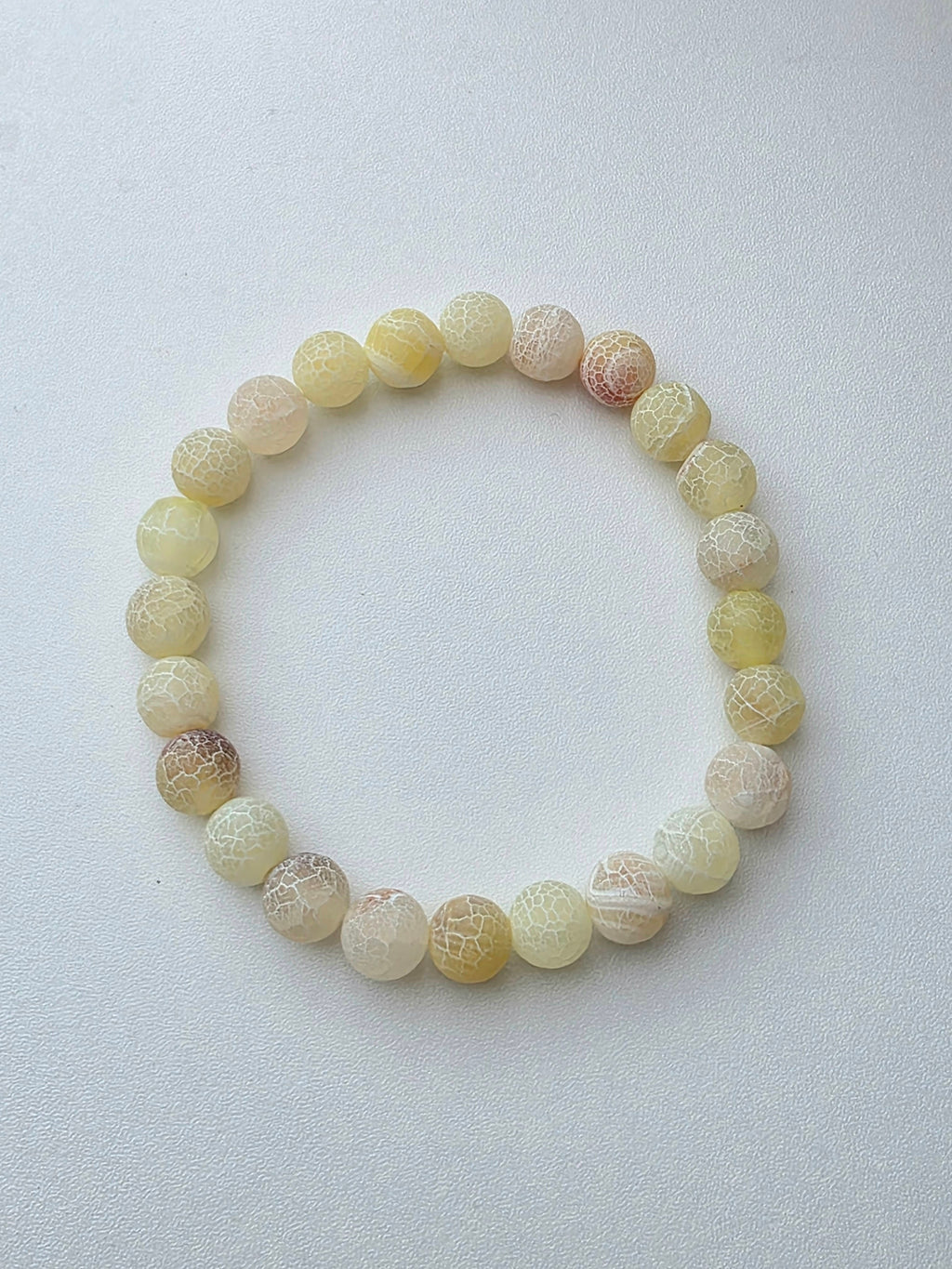 Bracelet en perles écaillées couleur jaune - la fabrique à pampilles