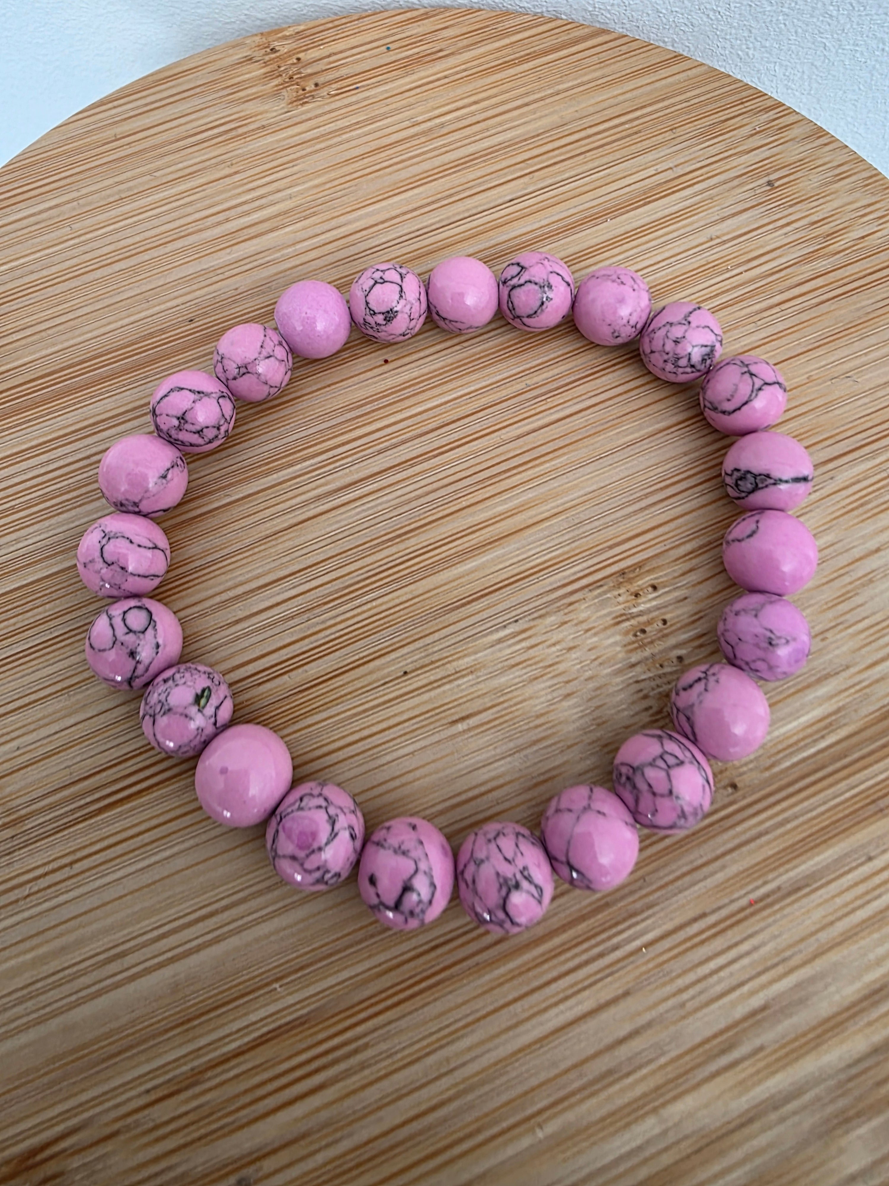 Bracelet perles zébrées 8mm - Rose