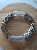 Bracelet maxi tubes gris paillettes zebré