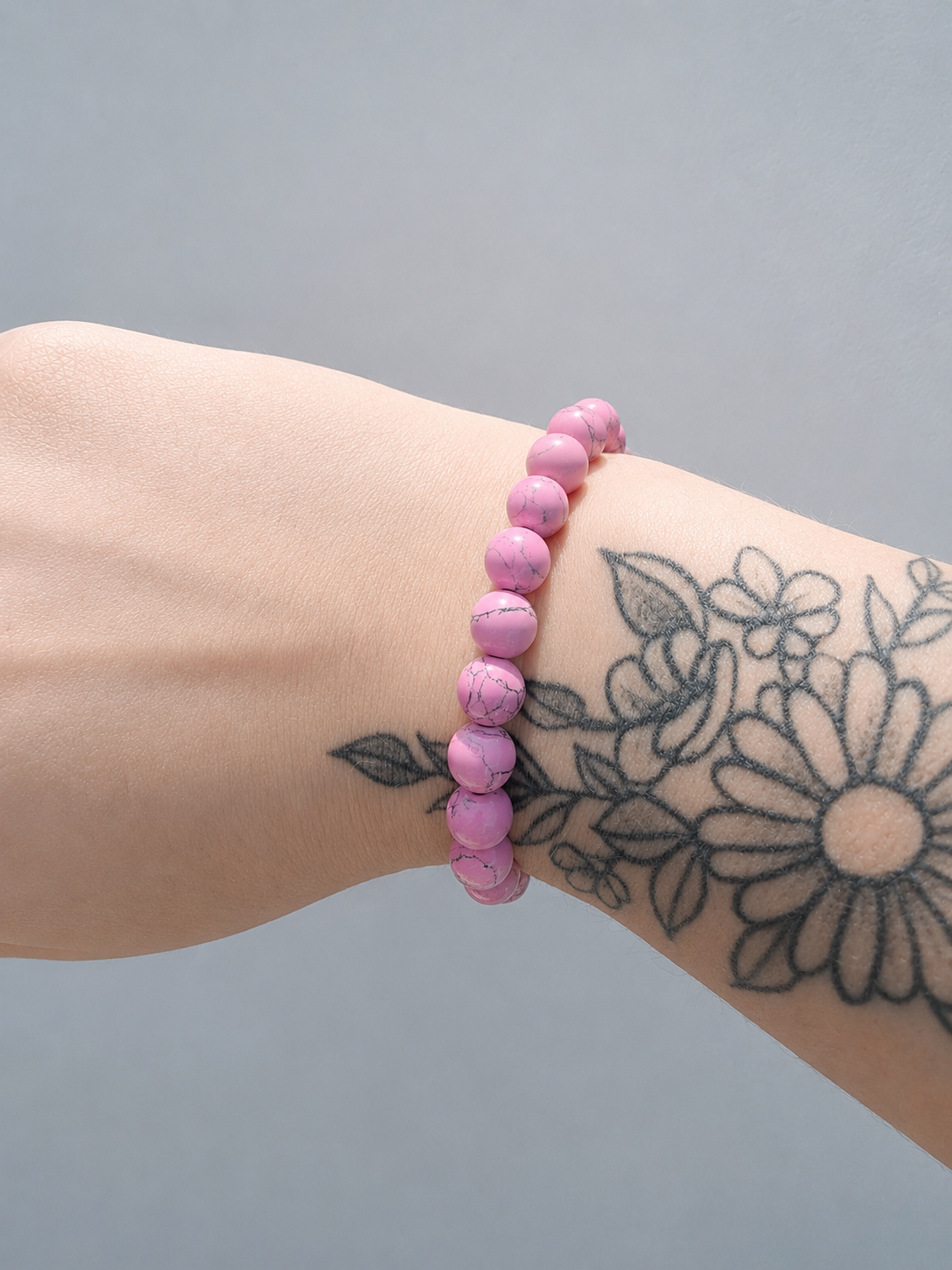 Bracelet perles zébrées 8mm - Rose
