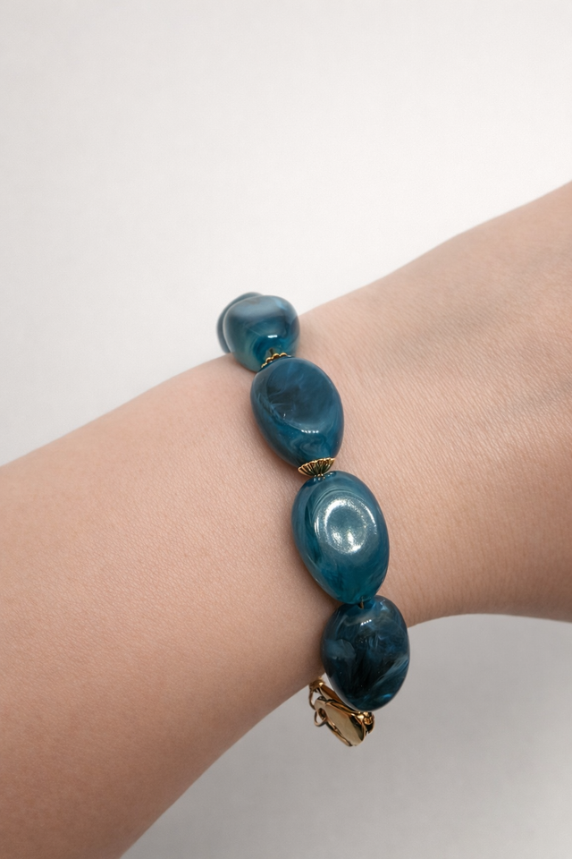 Bracelet en perles ovales couleur bleu canard- la fabrique à pampilles
