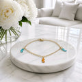 Bracelet breloques hippocampes bleu/orange