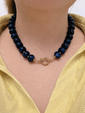 Collier de perles bleu marbré