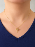 Collier nœud papillon doré