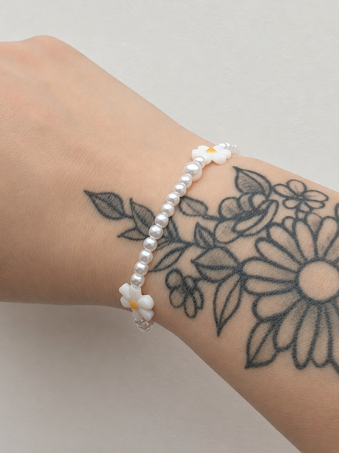 Bracelet perles et fleur