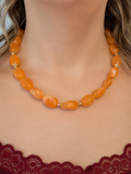 Collier perles ovales orange
