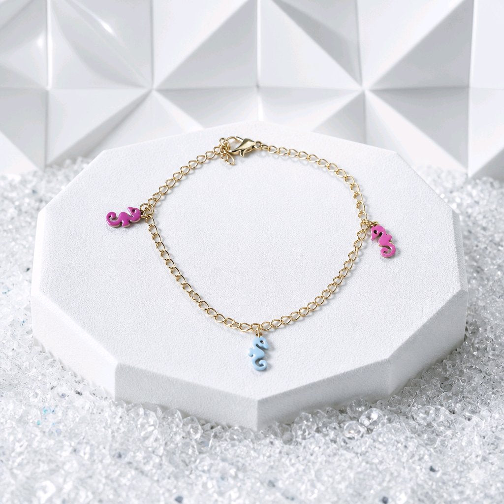 Bracelet breloques hippocampes rose/bleu