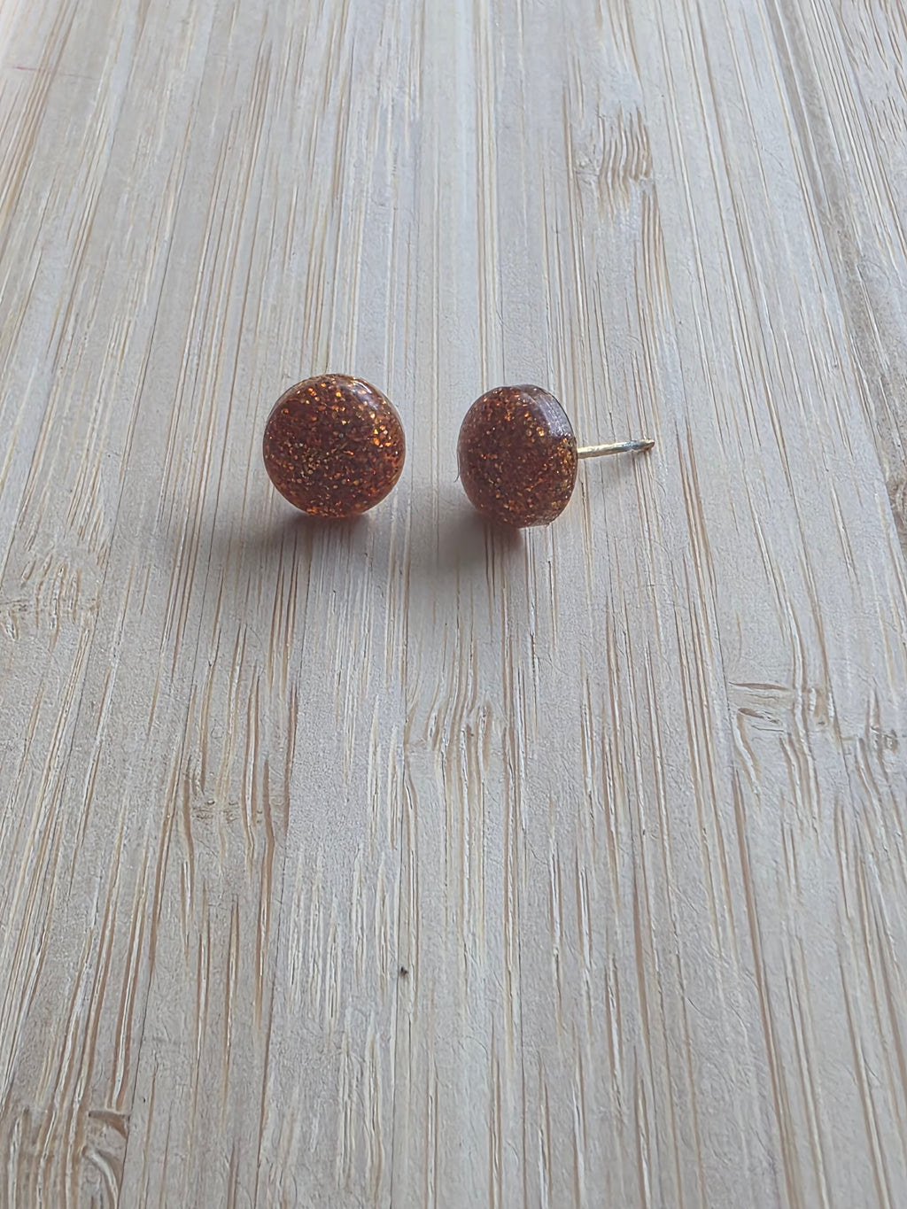 Puces d oreilles dome lisse-orange pailleté