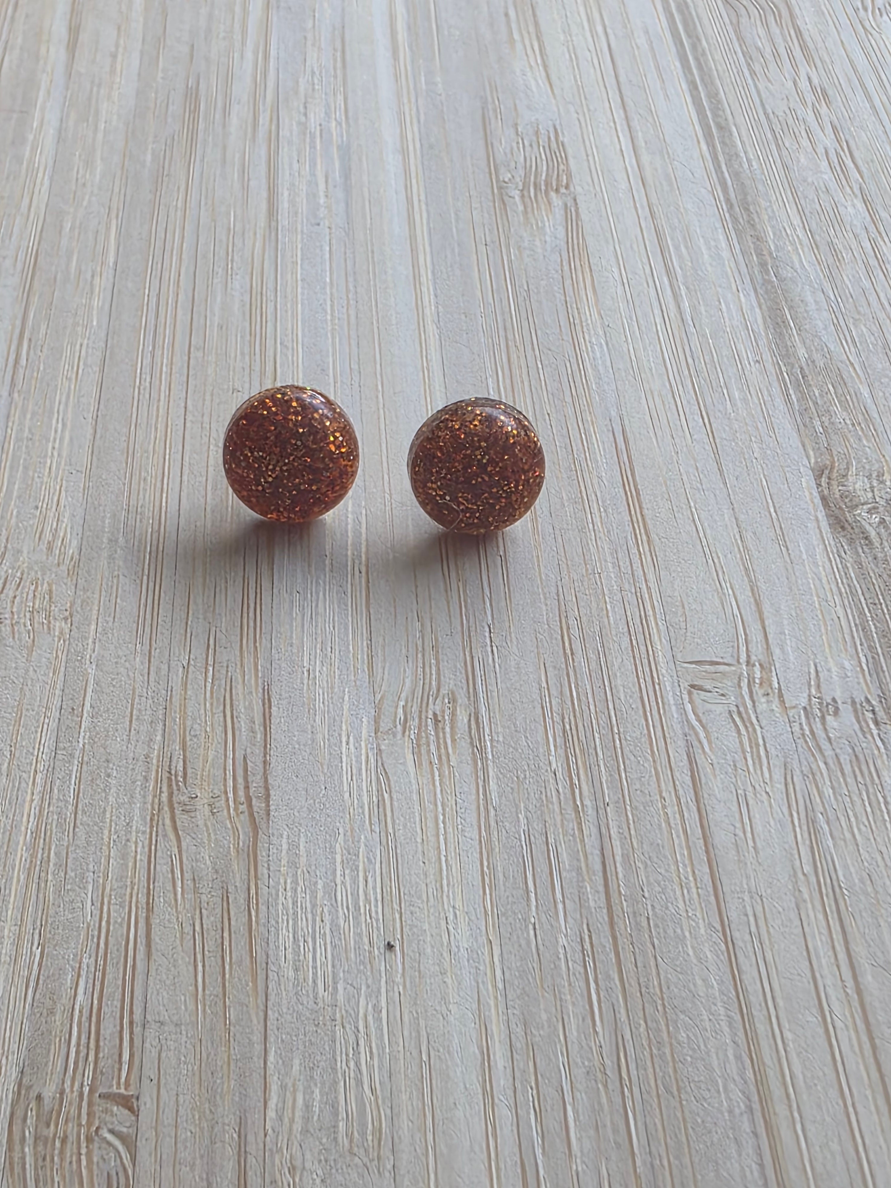 Puces d oreilles dome lisse-orange pailleté
