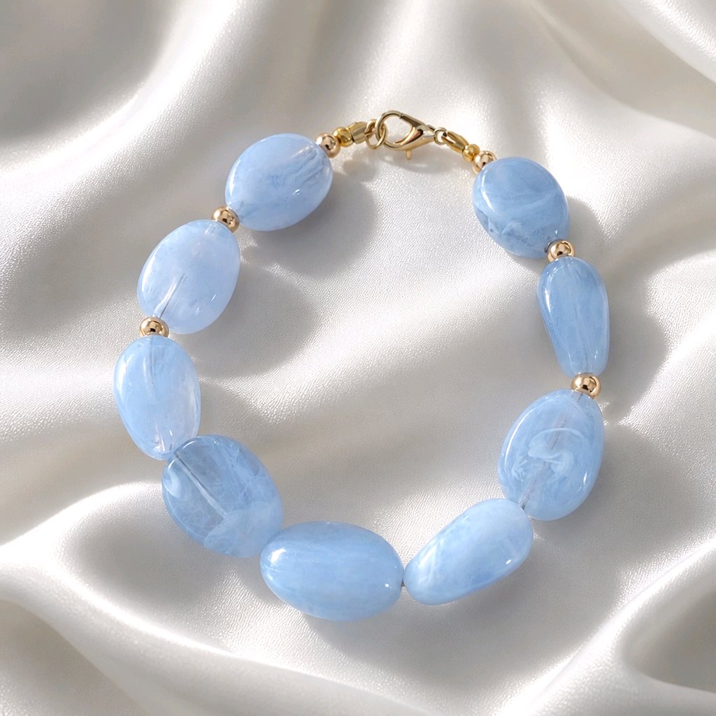 Bracelet perles ovales bleu glacier