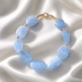 Bracelet perles ovales bleu glacier