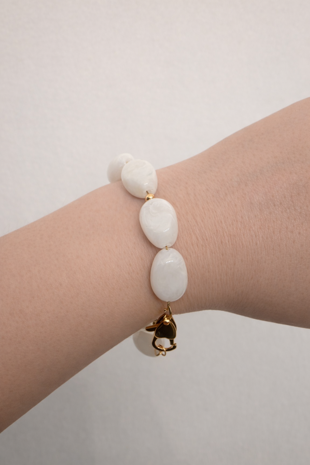 Bracelets perles ovales blanc