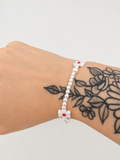 Bracelet perles et fleur coeur rouge