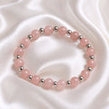Bracelet perles rondes roses