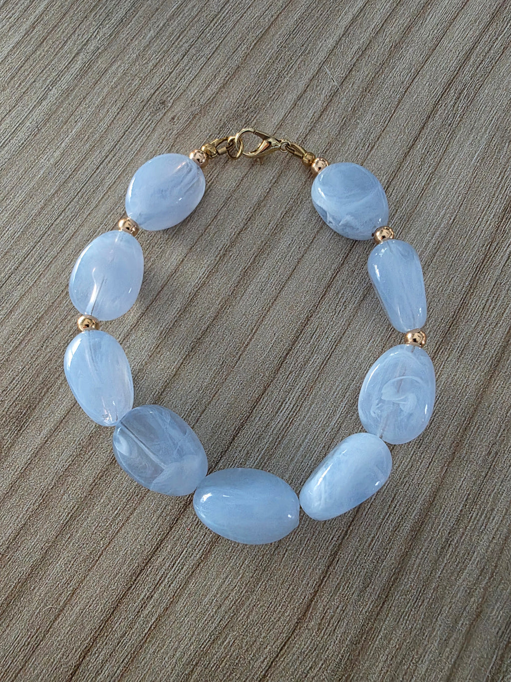 Bracelet perles ovales bleu glacier