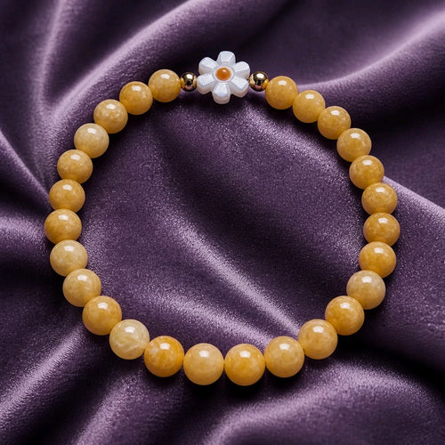 Bracelet élastique perles rondes jaunes avec fleur orangé