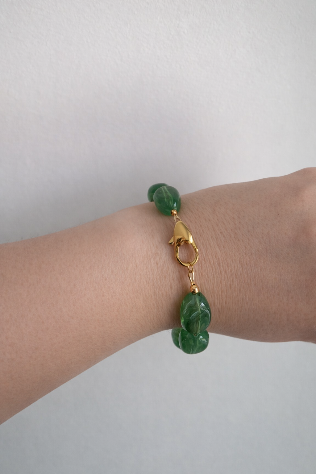 Bracelet perles ovales vert mousse