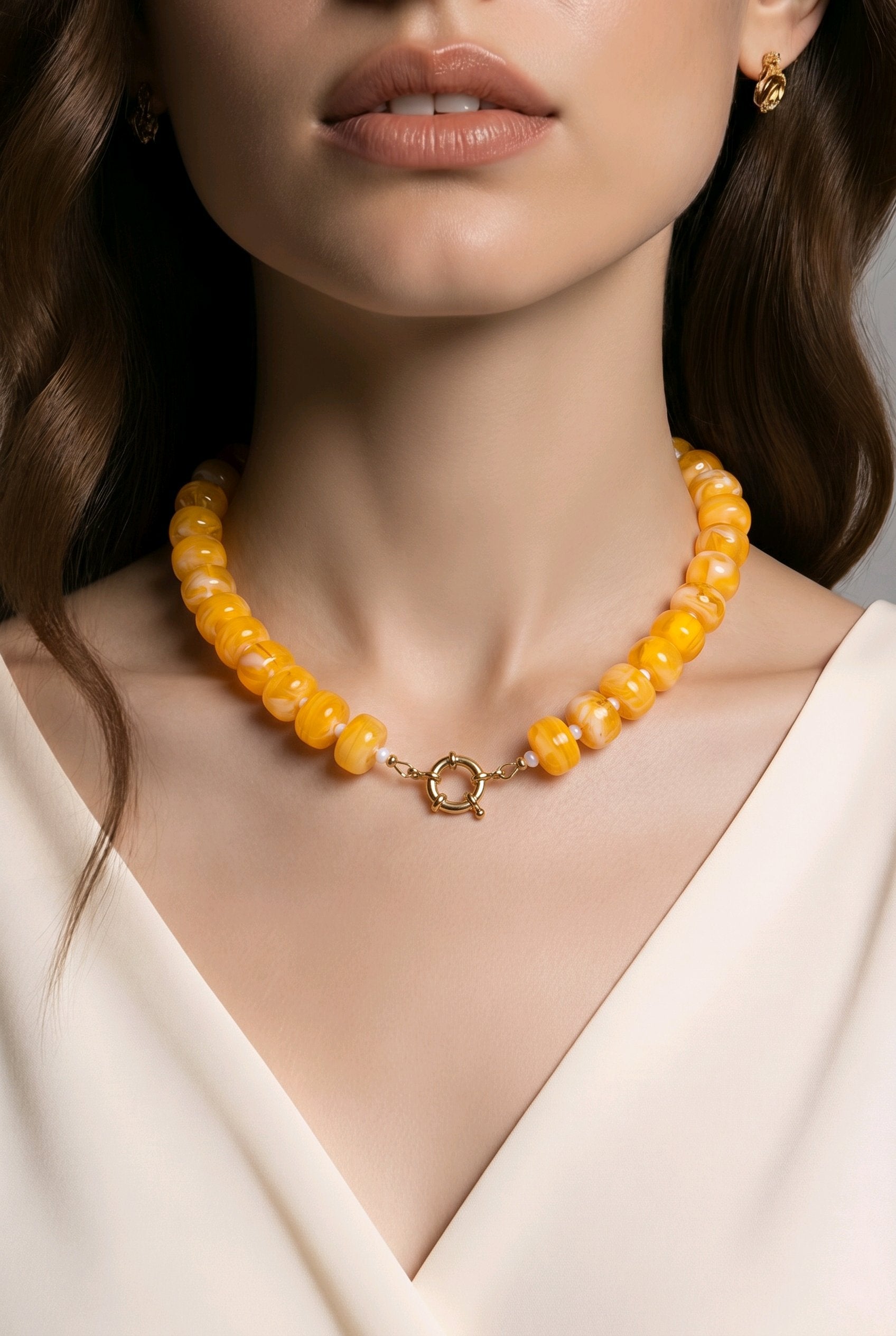 Collier de perles orange marbré