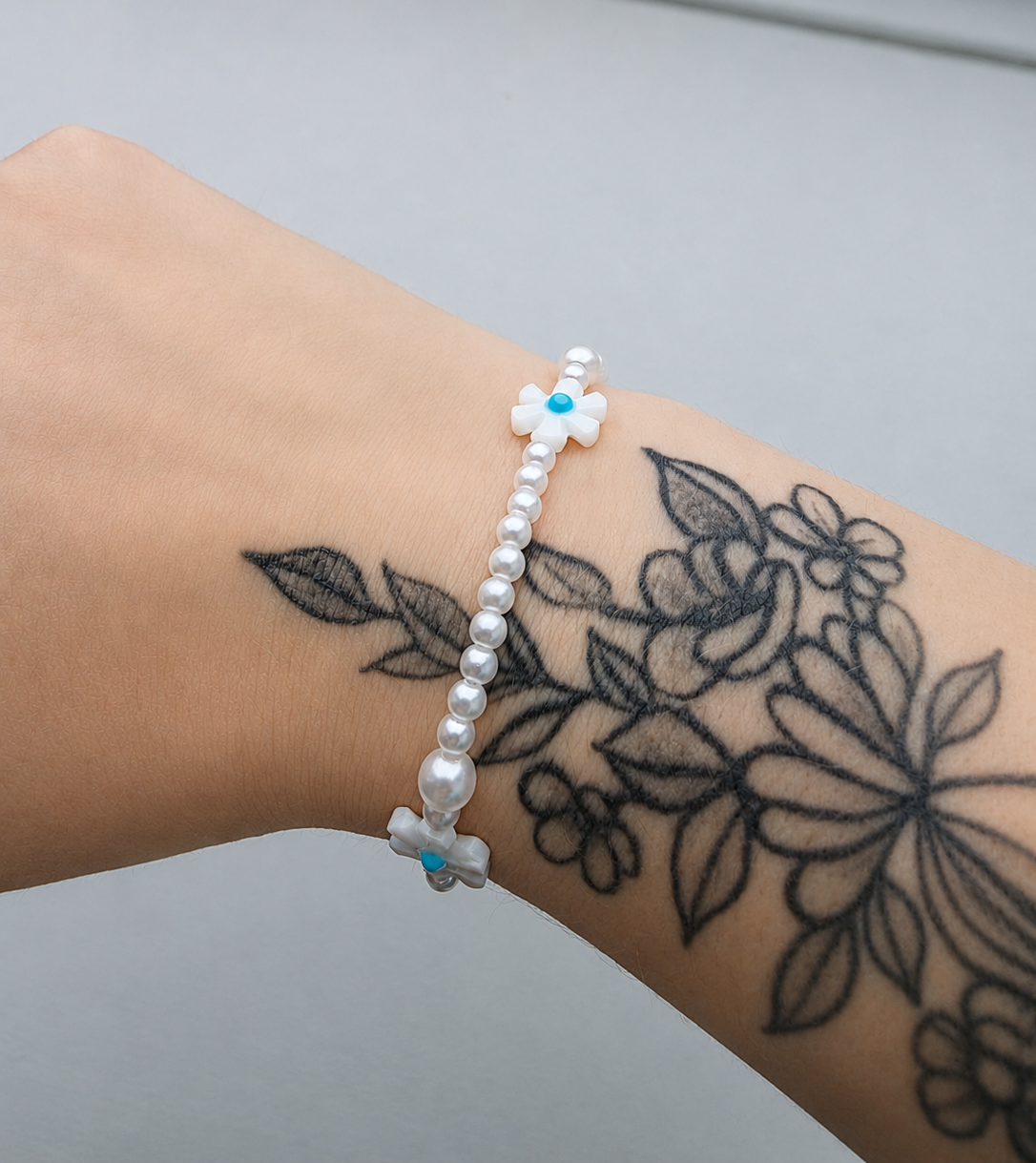 Bracelet perles et fleur