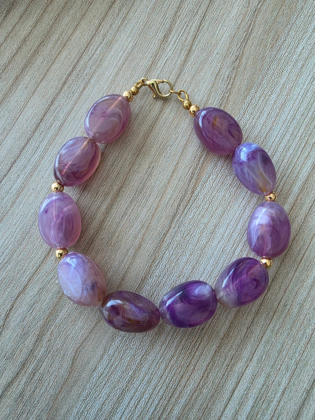 Bracelet perles ovales prune