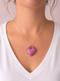 Collier argenté avec gros coeur rose pailleté
