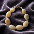 Bracelet perles plates ecru